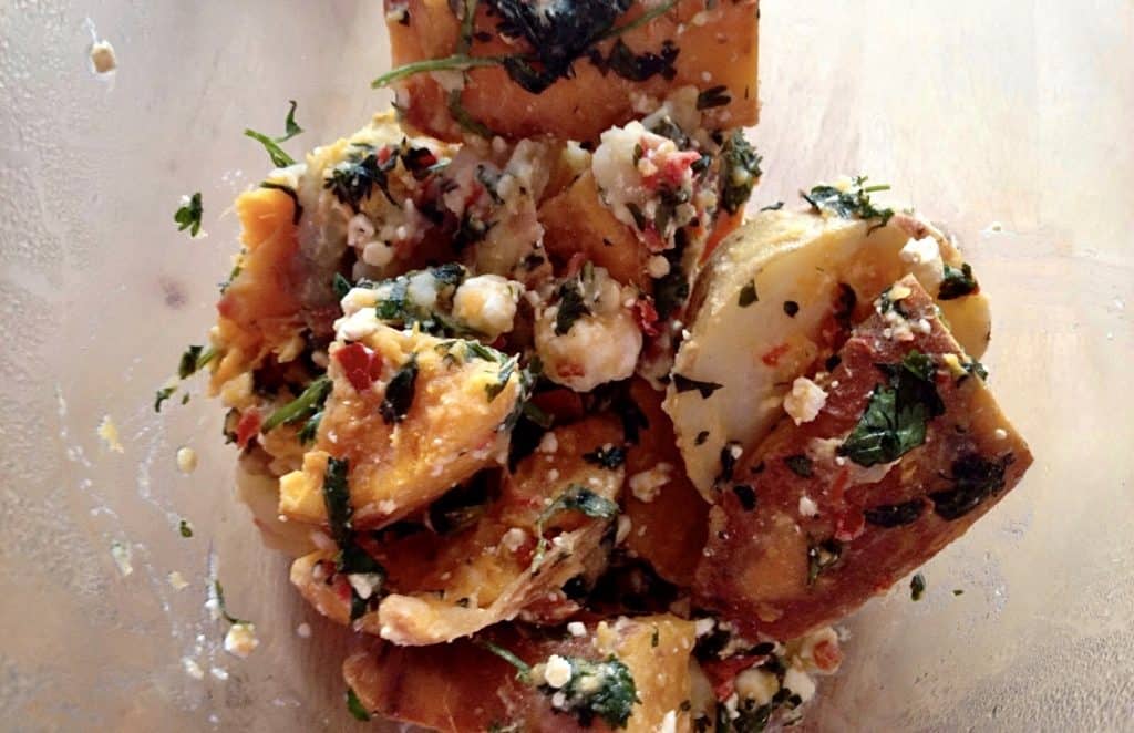 Mixed potato salad with feta and coriander