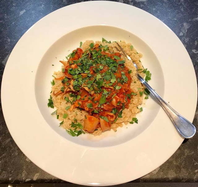 Instant Pot Squid Stew - squid, tomatoes, vegetables... so easy and so tender. Not rubbery at all! Serve on its own, with rice, with pasta, with quinoa or with crusty bread! Feisty Tapas Instant Pot Squid Stew - Alli's photo, served with quinoa