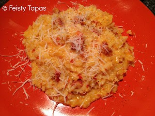 Photo of the risotto served on an orange plate