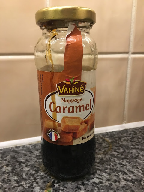 Photo of a half empty bottle of ready-made Vahiné Nappage caramel