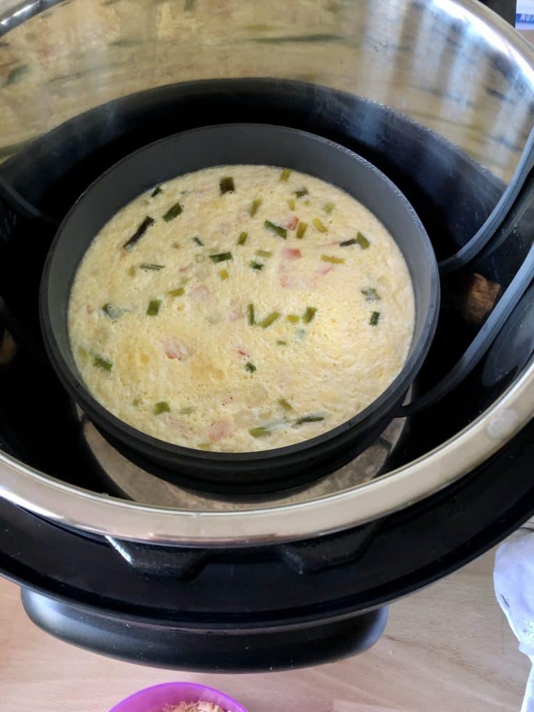 Photo of the Instant Pot Crustless Quiche just cooked and before browning the top