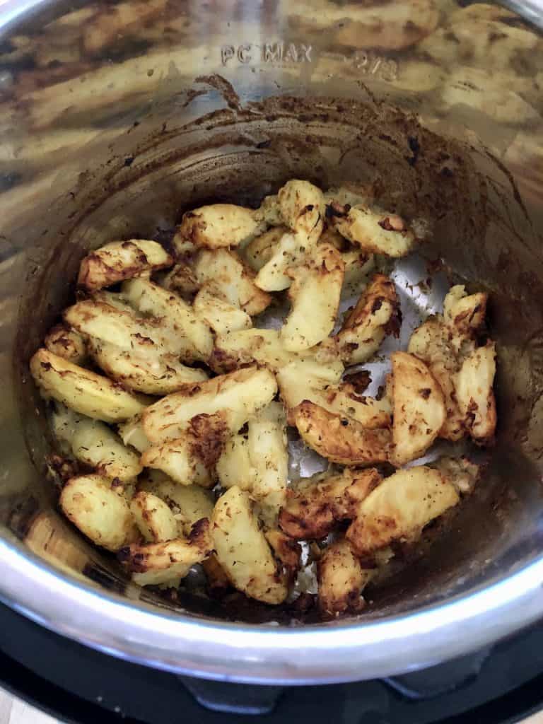 Photo of the delicious crispy Instant Pot Duo Crisp Greek Roast Potatoes