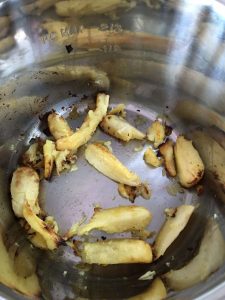 Photo of the parsnips ready to flip when the Instant Pot Duo Crisp's display says turn food