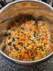 Pressure Coooker Mexican Rice in stainless steel inner pot just after pressure cooking, looking from above