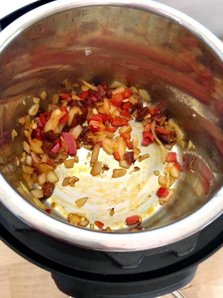 The chorizo, red pepper and onion after sautéing and before pressure cooking