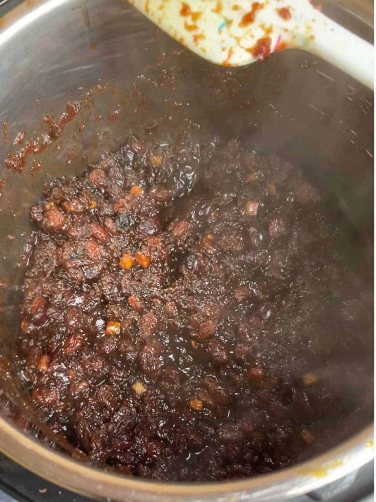 Photo of step 7 of Pressure Cooker Christmas Mincemeat - reducing with lid off pressure cooking, can see the steam