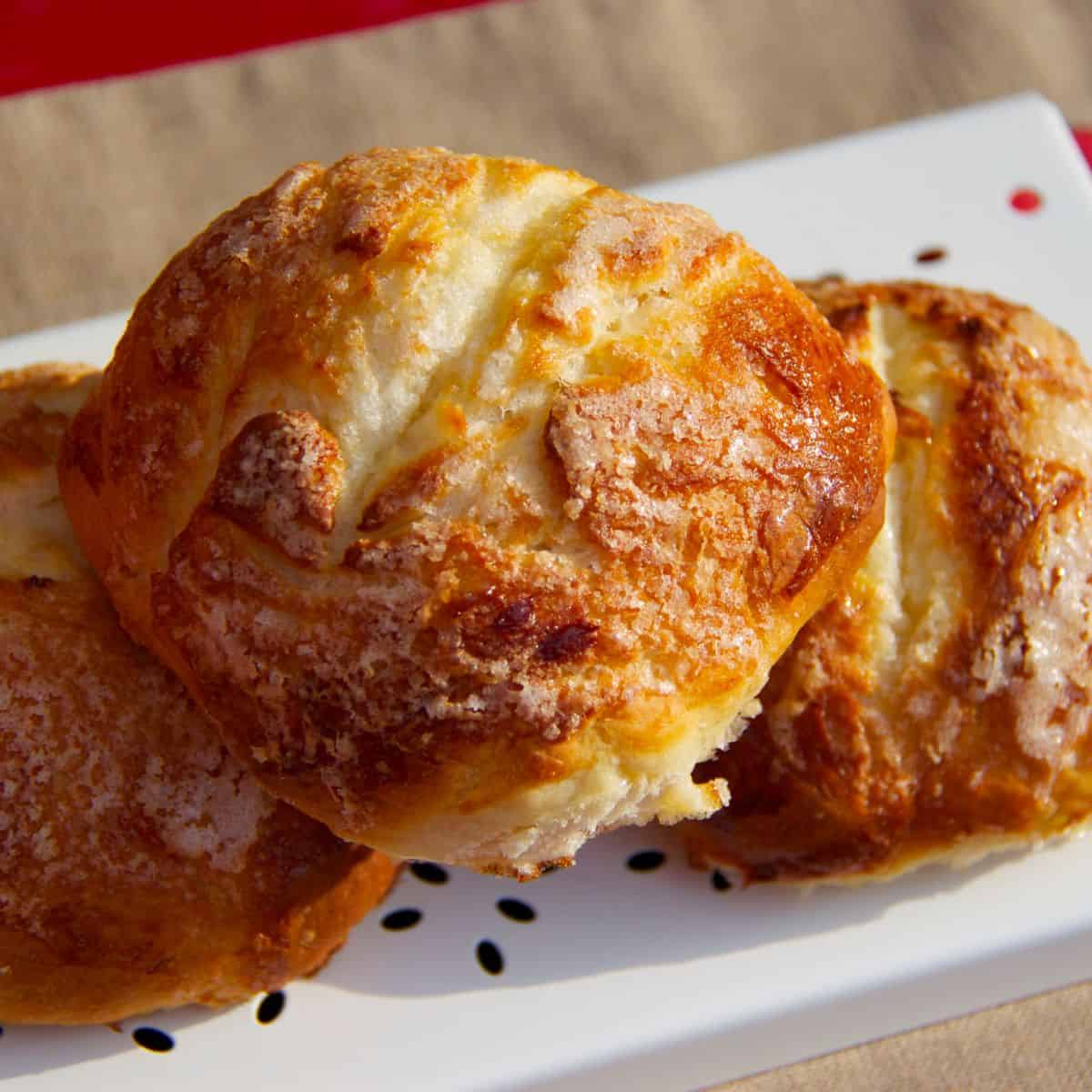 Photo of three Bollos Suizos and Medias Noches - Spanish Sweet Buns in the Thermomix (aka Maria's Thingies) seen piled up and looking delicious