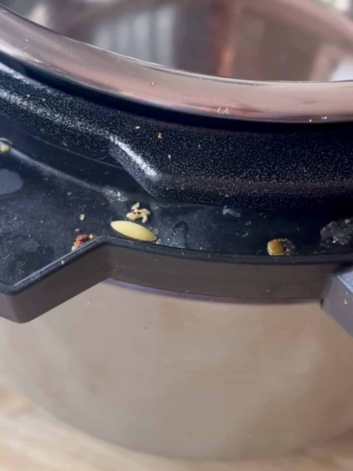 Photo of an example of a dirty Instant Pot rim that can cause the Burn notice