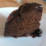 A delicious slice of pressure cooked Instant Pot chocolate pudding with oozing chocolate sauce