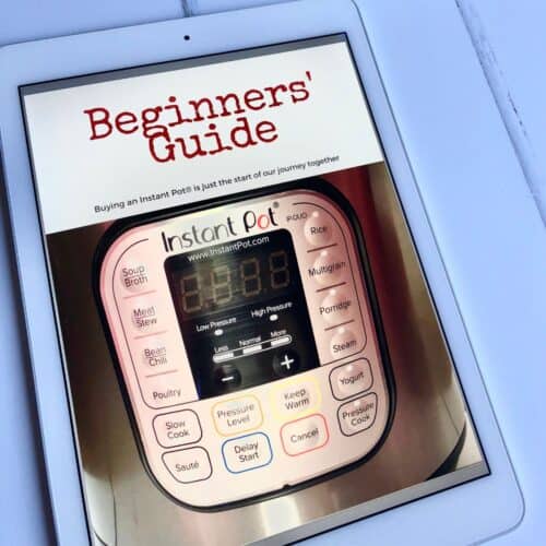 A white iPad shows the cover photo of The Instant Pot UK Beginners' Guide ebook against a white background